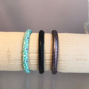 3 leather Woodstock bracelets. Each is 8” long.
